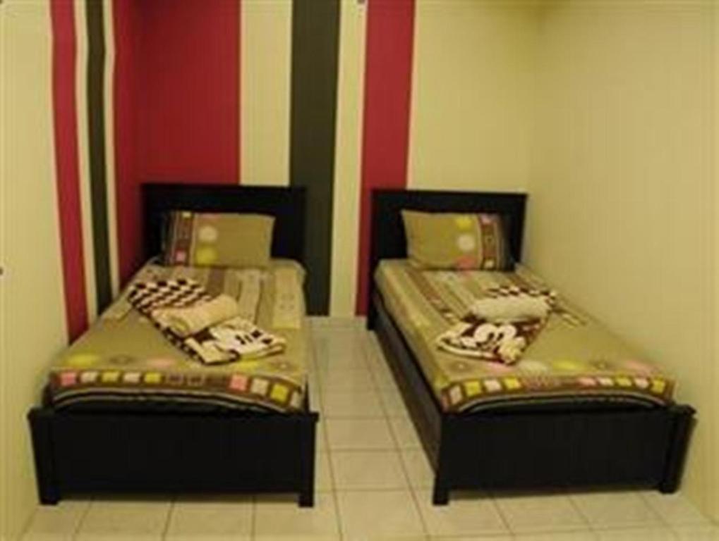 Matahari alojamiento Albergue Kuala Lumpur Habitación foto